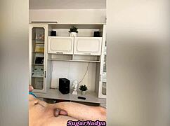 sugarnadya uses wax tweezers to remove hair from client's intimate areas