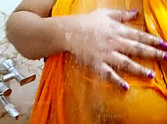 Sexy Indian Girl with Big Boobs Poses in Saree