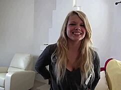 Young Taylor and her girlfriend cuddiled up, talking on a couch