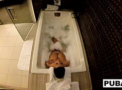 Sexy milf jezebelle bond casually films herself masturbating in the bath, showing big tits and ass.