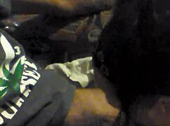 Amateur couple engages in blowjob and handjob while smoking a cigarette in the chair