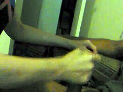Amateur couple engages in blowjob and handjob while smoking a cigarette in the chair