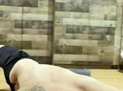 sexy bodybuilder stretches her muscular body