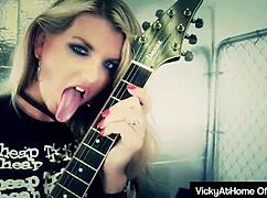 Vicky Vette rubs pussy, gives titjob