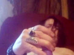 The sexy goth chick masturbates her tight pussy hard.