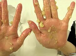 Asian hand crushes banana in messy fetish