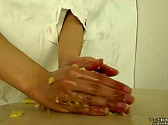 Asian hand crushes banana in messy fetish