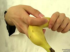 Asian hand crushes banana in messy fetish