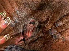 Look at this black ebony's hairy pussy up close in HD!