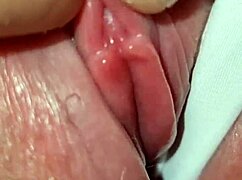 Hidden behind her gorgeous cameltoe, I found her tiny clit and played with it until she cums