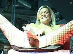 Horny Slut Spreading Legs Wide at Public Sex Show