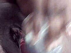 black whore masturbates with dildo, squirting orgasm like waterfall