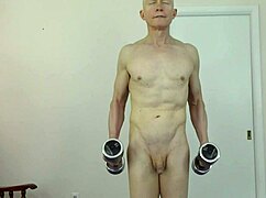 Gay nudists exercising on the beach