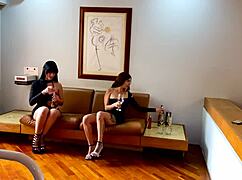 Latina lesbians licking big tits on the sofa