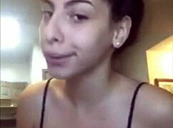 Kat with her big tits on display.