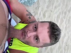 Passionate blowjob on public gay beach evokes intense emotions