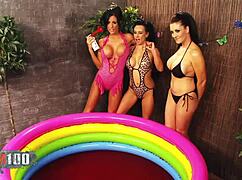 lesbian threesome in pool with sauce