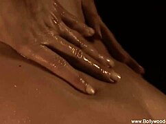 She dances gracefully showing her nude body.