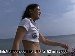 brunette dream girl flashes shaved pussy and tiny tits nude at beach