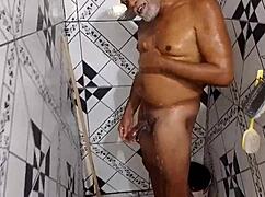 Gugu dances in bathroom with hard dick, teasing for gay fun. Show me that action!