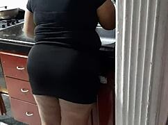 I interrupted the cleaning lady washing dishes to suck my big cock