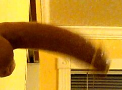 Watch this gay guy in hood deepthroat a dildo?