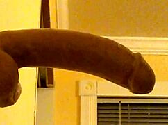 Watch this gay guy in hood deepthroat a dildo?