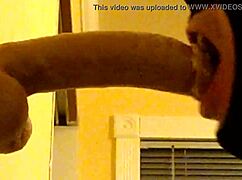 Watch this gay guy in hood deepthroat a dildo?