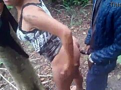 Milf couple fucks outdoors in forest