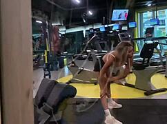 A skinny blonde with long hair roleplays gym training before dragging guy to bed for big cock fucking