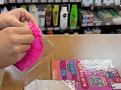 asian ladyboy showing new thong in convenience store