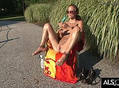 Brunette babe suns her naked body then masturbates with toys to orgasm