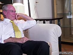 Horny old man jerks off while Ivy gives blowjob and shows her ginormous tits. She impresses him so much.