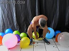 richard lennox, horny gay dilf, indulges in balloon play with monster cock.