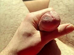 She edges from flaccid playing with precum