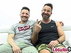 John Brachalli fucks Martin Mazza hard on the sofa with big cocks bareback