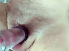 a tail plug in my ass while pumping my hard dick close up