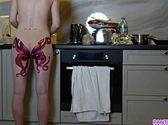 naked milf with octopus ass tattoo cooks dinner and ignores your stares
