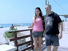 The brunette DEEPTHROATS and SQUIRTS outdoors