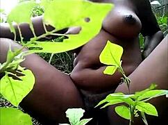 tribal african fingering herself in the wood