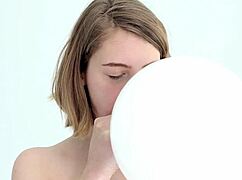 Young Babe Blowing And Popping First Balloon.