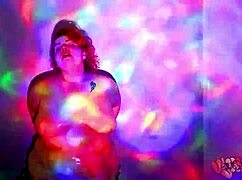 This bbw goddess is dancing and getting oiled up