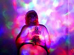This bbw goddess is dancing and getting oiled up