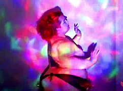 This bbw goddess is dancing and getting oiled up