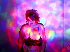 This bbw goddess is dancing and getting oiled up