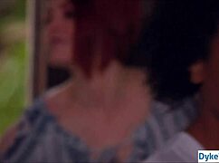 Black and white lesbians kiss passionately