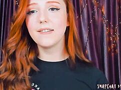 This redhead blows herself on webcam.