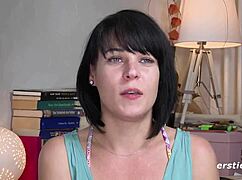 Brunette solo fingering her hairless pussy to orgasm. European beauty enjoys every intense moment.