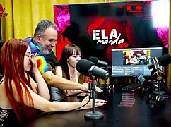 GIH SPANIC BENDS OVER THE REDHEAD ON THE PODCAST TABLE TO SHOW HER PINK PUSSY - POP IN THE SHACK - SHE COMMANDS