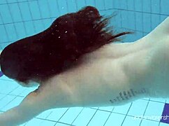 Roxalana Cheh Poses As Sexy Redhead Underwater